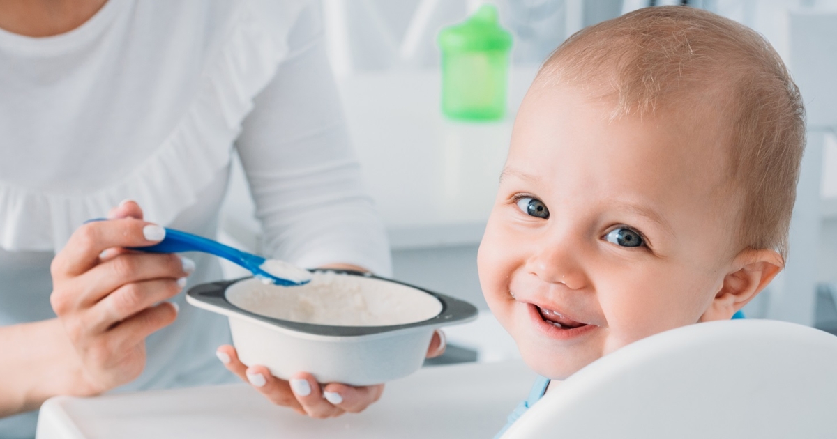 Feeding rice to sale baby